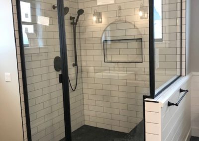Modern subway tile shower installation